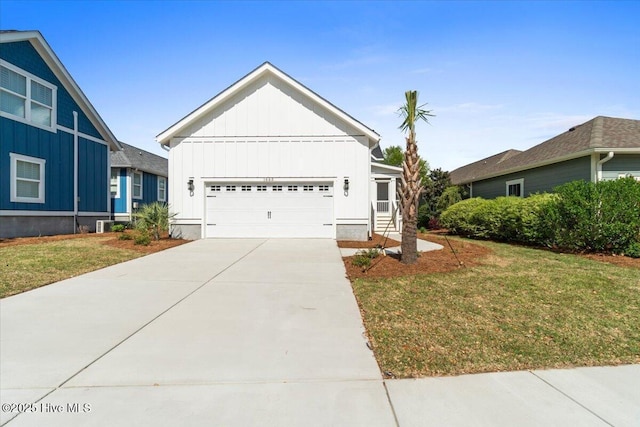 1665 Butterfly Knot Dr SW, Ocean Isle Beach, NC 28469 - single story home with board and batten siding, a front yard, a garage, and driveway