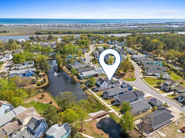 1665 Butterfly Knot Dr SW, Ocean Isle Beach, NC 28469 - aerial view of property's location with nearby suburban area and a large body of water