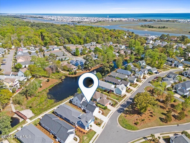1665 Butterfly Knot Dr SW, Ocean Isle Beach, NC 28469 - aerial overview of property's location with a nearby body of water and nearby suburban area