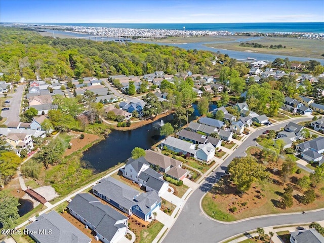 1665 Butterfly Knot Dr SW, Ocean Isle Beach, NC 28469 - aerial overview of property's location with a nearby body of water and nearby suburban area