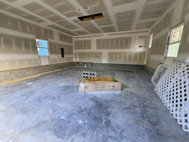 misc room with concrete floors