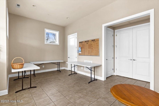 1665 Butterfly Knot Dr SW, Ocean Isle Beach, NC 28469 - office space with light tile patterned flooring and baseboards