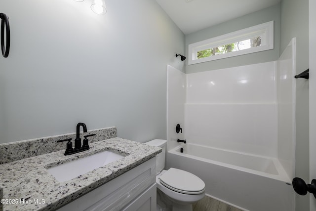 682 Crump Farm Rd, New Bern, NC 28562 - bathroom featuring toilet, tub / shower combination, wood finished floors, and vanity