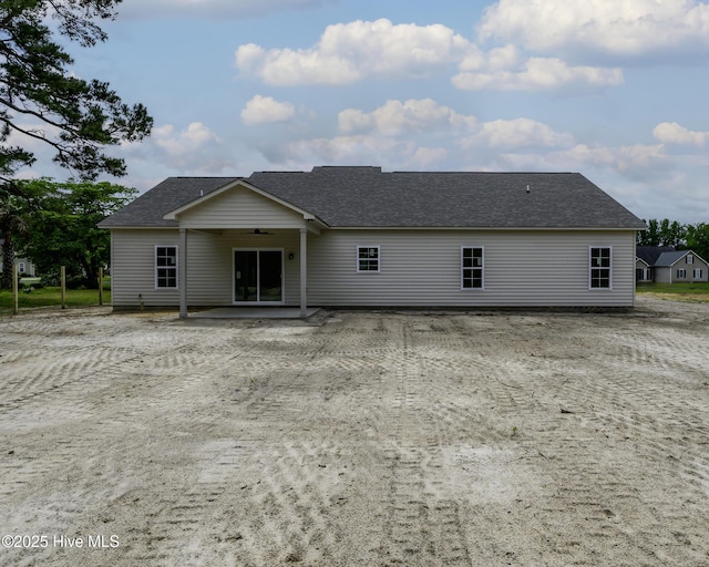 682 Crump Farm Rd, New Bern, NC 28562 - back of property featuring roof with shingles, a ceiling fan, and a patio area