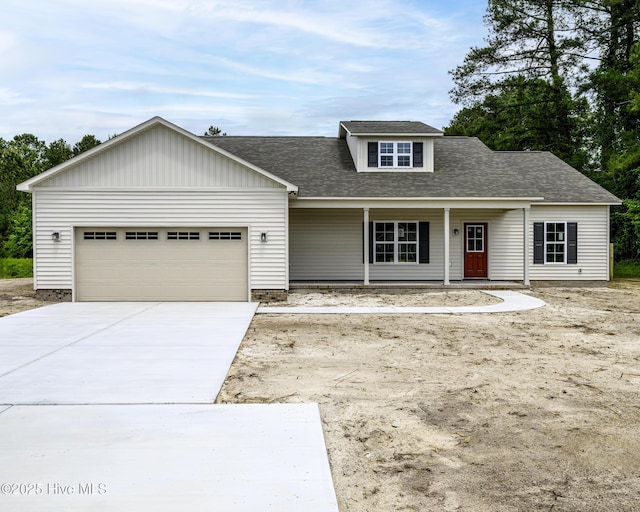 682 Crump Farm Rd, New Bern, NC 28562 - view of front of property featuring concrete driveway, an attached garage, covered porch, and roof with shingles