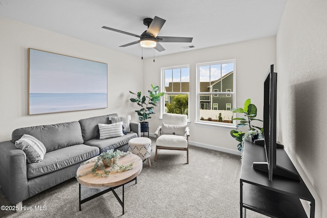 living room featuring ceiling fan and carpet flooring