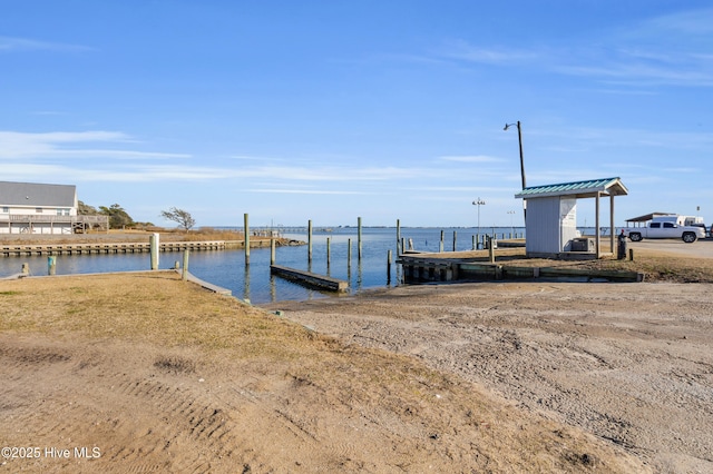 dock area with a water view