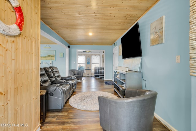 living room featuring wood ceiling and dark hardwood / wood-style flooring