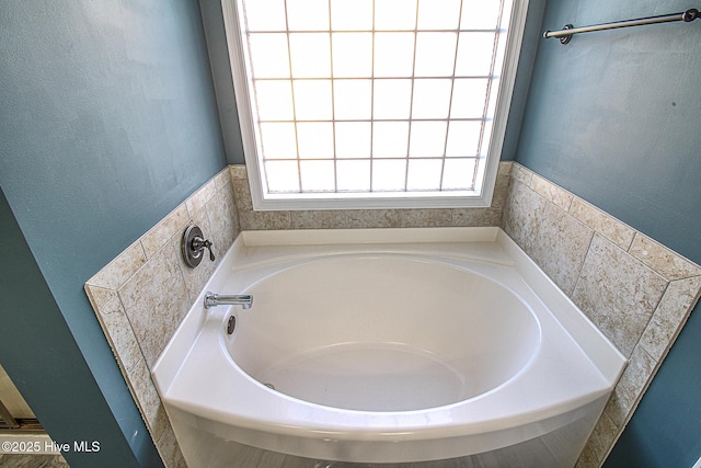 full bath featuring a garden tub