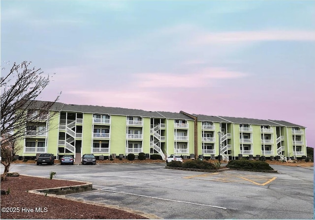 view of outdoor building at dusk