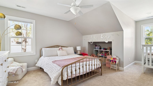 carpeted bedroom featuring lofted ceiling and ceiling fan