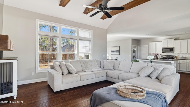 living room with beam ceiling, ceiling fan, dark hardwood / wood-style floors, and high vaulted ceiling