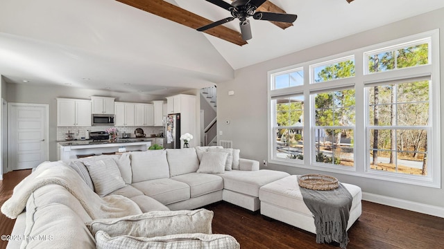 living room with beamed ceiling, high vaulted ceiling, dark wood-type flooring, and ceiling fan