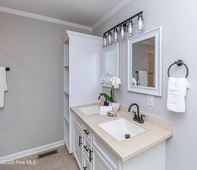 bathroom featuring tile patterned floors, ornamental molding, and vanity