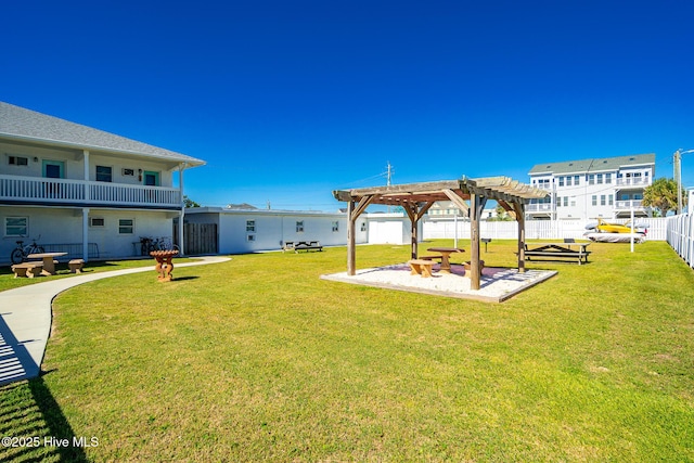 view of yard with a pergola and a patio area