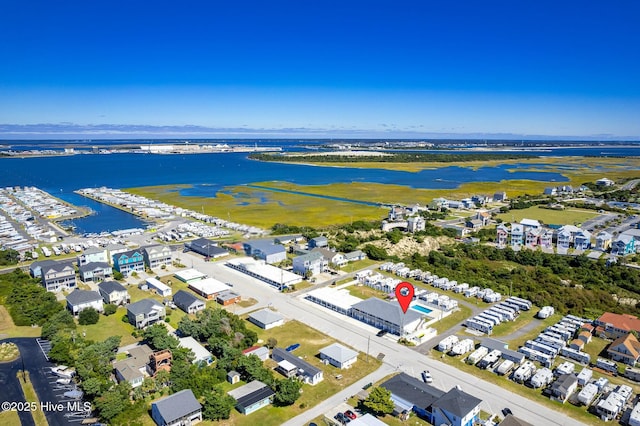 bird's eye view with a water view