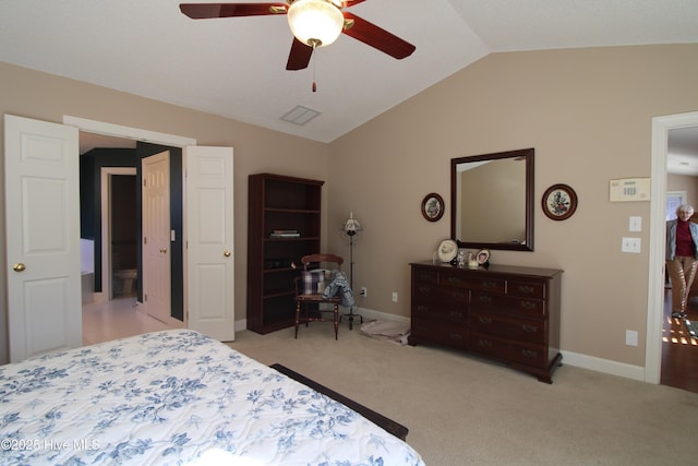 bedroom with lofted ceiling, light colored carpet, and ceiling fan