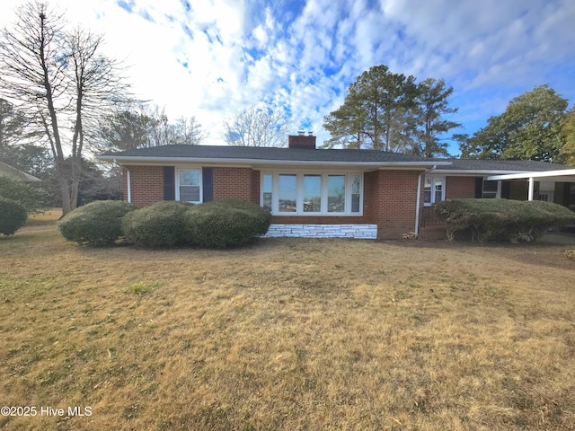 single story home with a front yard