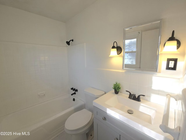 full bathroom featuring toilet,  shower combination, tile walls, and vanity