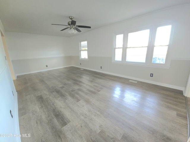 unfurnished room with ceiling fan and light hardwood / wood-style flooring