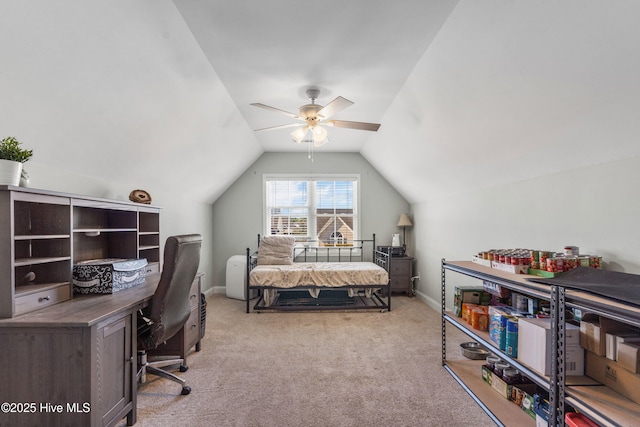 bedroom featuring lofted ceiling, light colored carpet, and ceiling fan