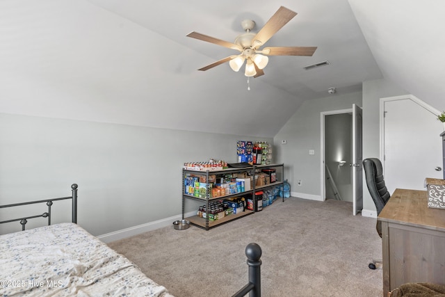 carpeted bedroom featuring vaulted ceiling and ceiling fan