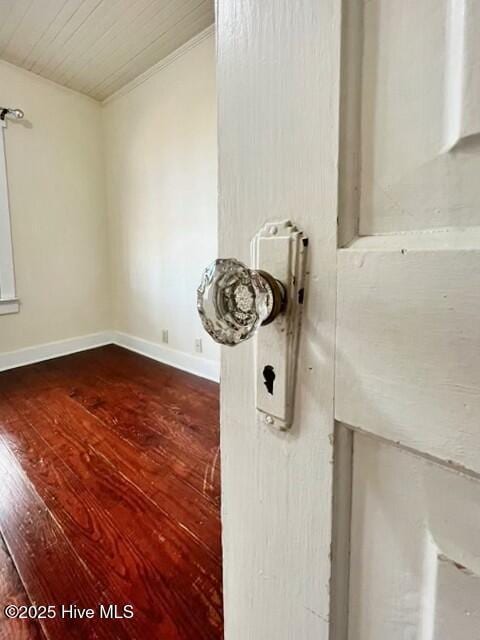 interior details featuring hardwood / wood-style flooring