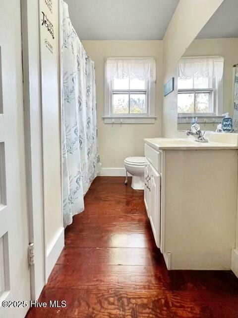 420 Rocky Hock Creek Rd, Edenton, NC 27932 - full bathroom featuring vanity, baseboards, toilet, and wood finished floors