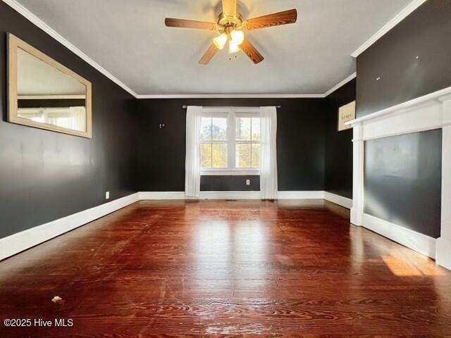 unfurnished living room with ceiling fan, crown molding, and hardwood / wood-style flooring