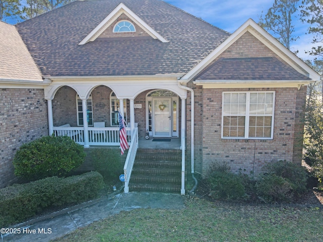 view of front of home featuring covered porch