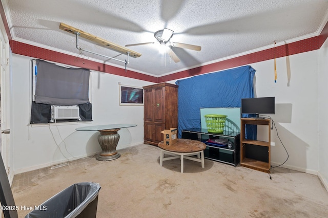 interior space with ceiling fan, carpet, cooling unit, and a textured ceiling