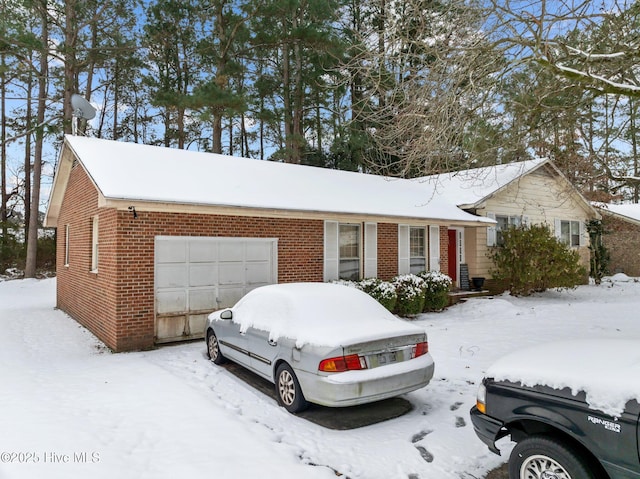 single story home featuring a garage