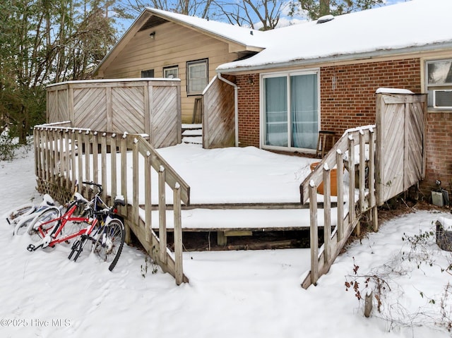 view of snow covered deck