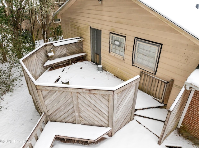 view of snow covered deck