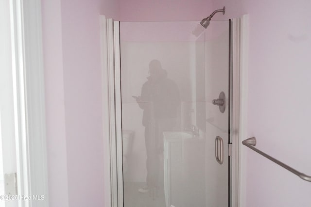 bathroom with walk in shower