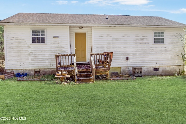 back of house with a yard