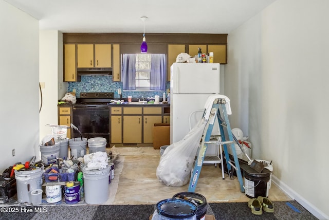 kitchen featuring decorative light fixtures, sink, decorative backsplash, white refrigerator, and black electric range