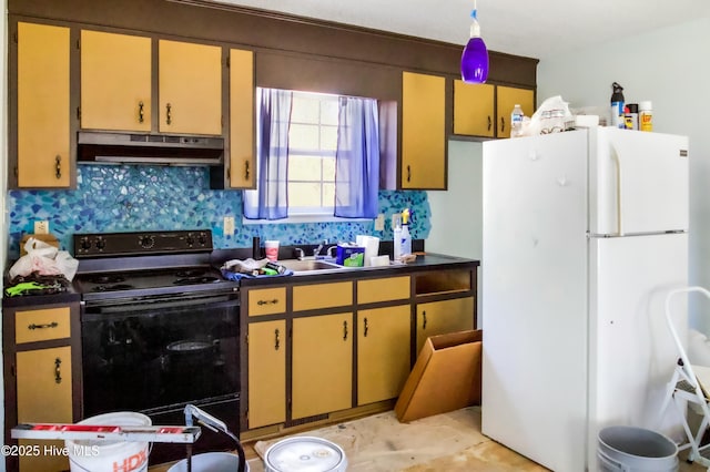 kitchen featuring black range with electric stovetop, sink, and white fridge