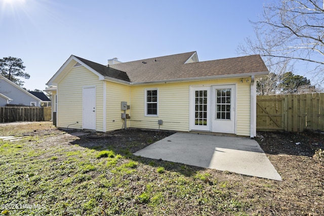 rear view of house featuring a patio