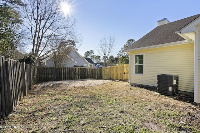 view of yard featuring central AC unit