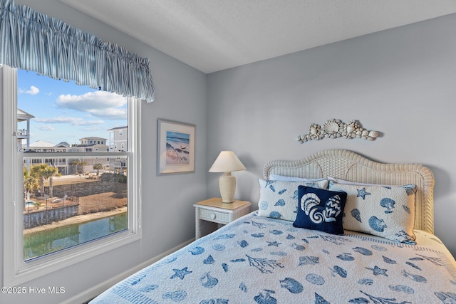 bedroom featuring a textured ceiling