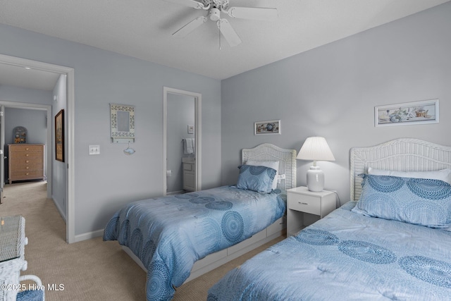 bedroom with ceiling fan and light carpet