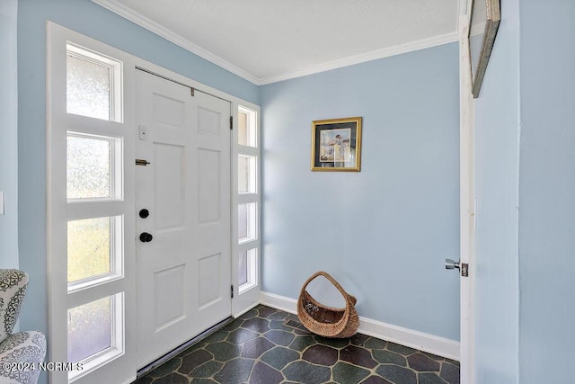 entrance foyer featuring ornamental molding and a healthy amount of sunlight