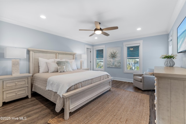 bedroom with crown molding, dark wood-type flooring, and ceiling fan