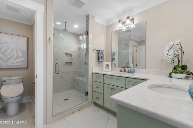 bathroom with vanity, ornamental molding, toilet, and walk in shower