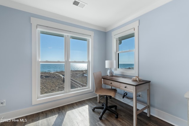 home office with a water view, ornamental molding, and dark hardwood / wood-style floors