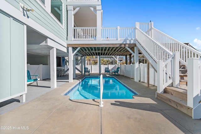 view of swimming pool with a patio area