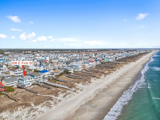 bird's eye view with a view of the beach and a water view