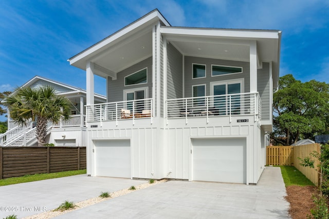 modern home with a garage and a balcony