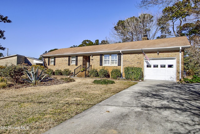 ranch-style home featuring a garage